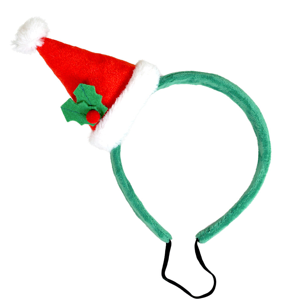 Grüner Kopfreif mit kleiner rot-weißer Weihnachtsmütze